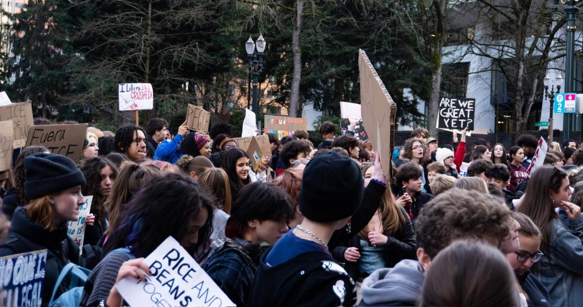On Tuesday Jan 20, students stand at the Portland City Hall in protest to ICE activity in Minnesota and across the US. Photo by Grace Olszewski.